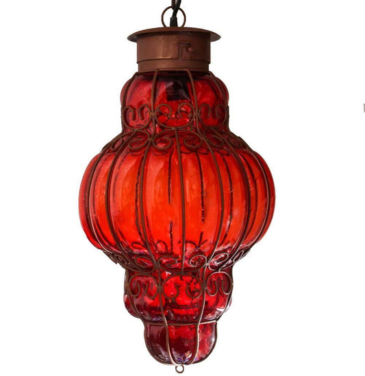 Red blown glass pendant lamp with metal frame and hanging loop, handcrafted in Mexican artisan style
