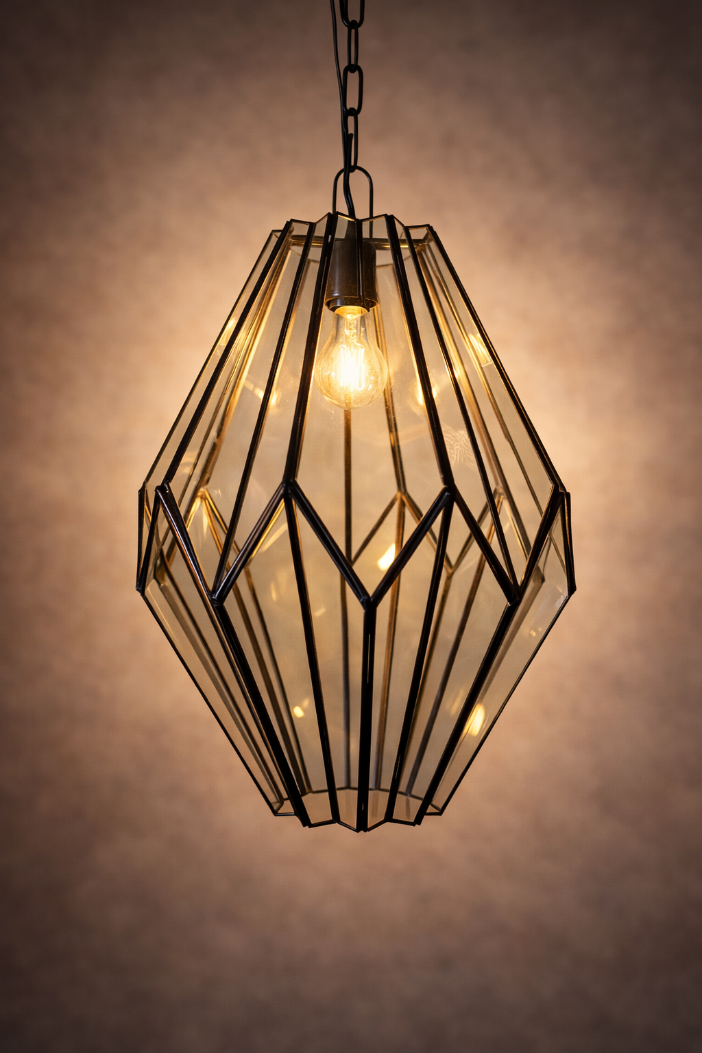 Decorative pendant light with geometric design on a warm brown background